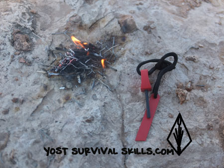 how to make a fire using a ferrocerium rod fire starting kit to ignite fine tinder in the Mojave Desert
