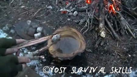 Using hot rocks to boil water is a great way to do your primitive cooking.