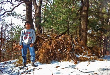 A cold weather debris hut I made as a quick survival shelter in Wisconsin.