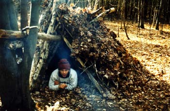 Debris huts are one of the easiest survival shelters to windproof.